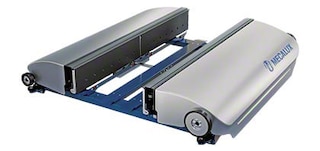 La navette du Shuttle System introduit et extrait automatiquement les bacs de leurs emplacements